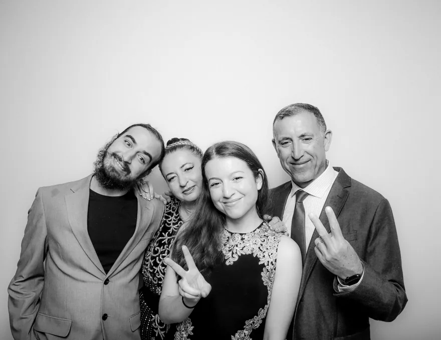 Black and white Glam Photo Booth group portrait of two couples at an Orlando wedding