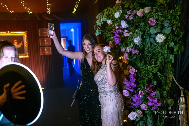 Roaming photographer capturing guest candids at an Orlando corporate reception
