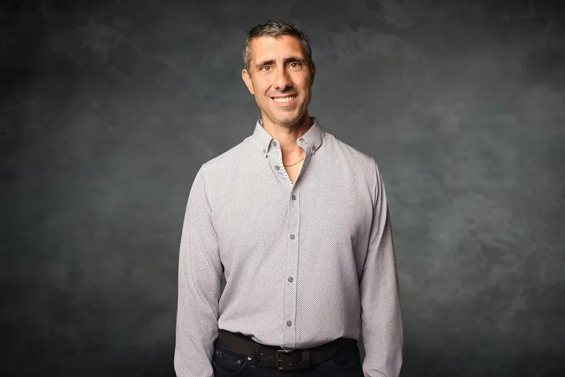 Professional on-site headshot captured at a corporate headshot booth