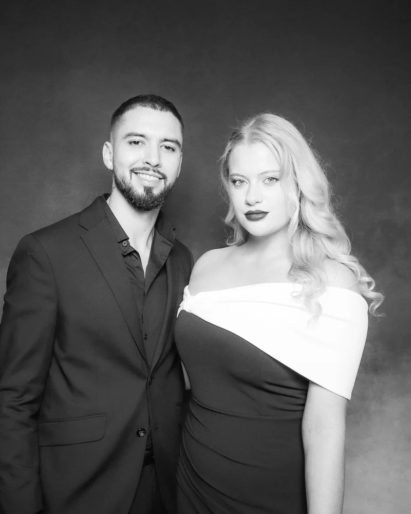 Beauty-style black and white glam booth portrait of a couple by Strata Booth