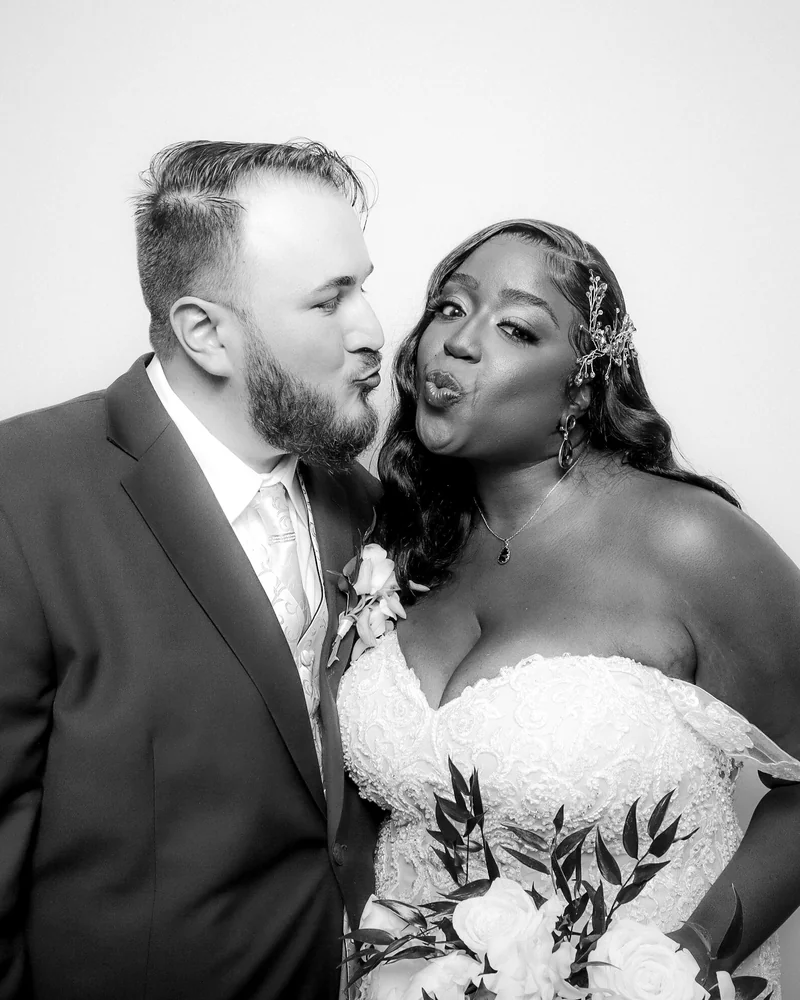 Black and white glam photo booth portrait of a couple at an Orlando wedding