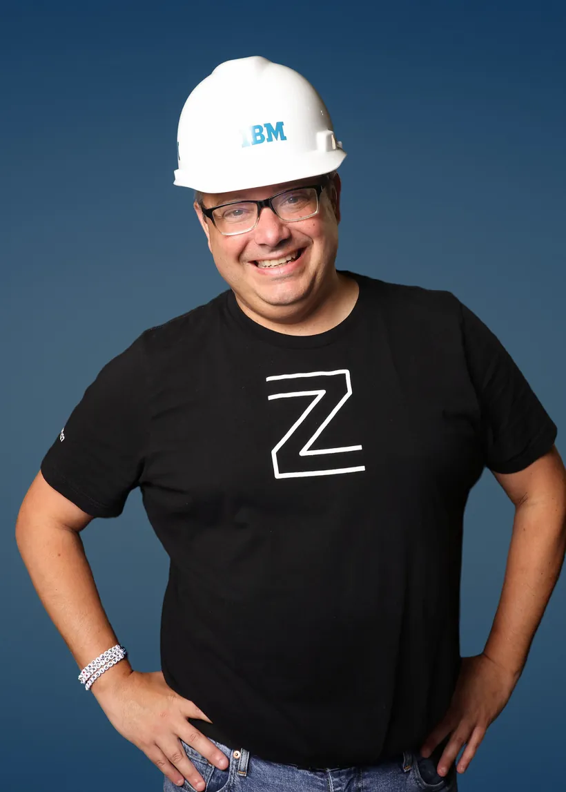 Branded headshot activation portrait of an attendee in company apparel