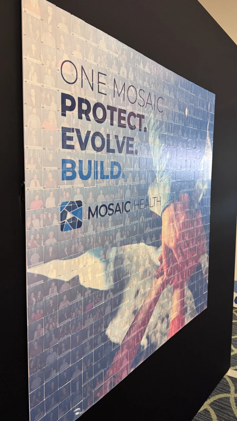 Close view of individual photo tiles forming the Mosaic Health branded artwork