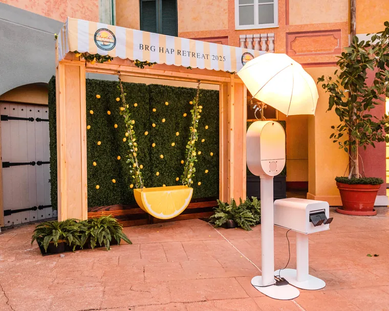 Brand activation photography of a branded outdoor experiential setup at a corporate event