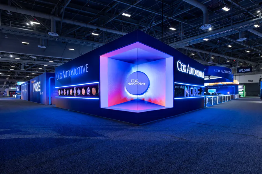 Orlando trade show photography of an illuminated exhibitor booth on a convention center expo floor