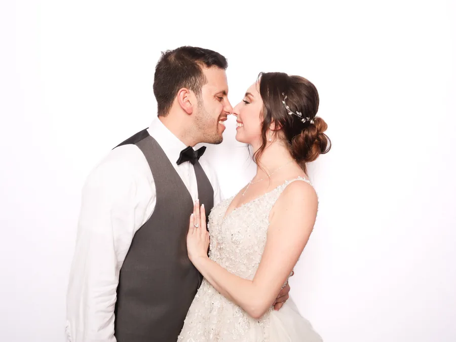 Bride and groom posing for a Pro DSLR wedding photo booth portrait at an Orlando wedding