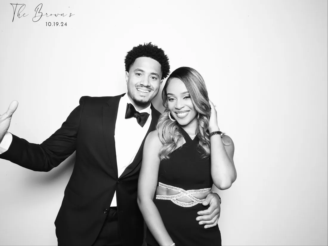 Wedding guests enjoying a Strata Booth photo booth at an Orlando reception