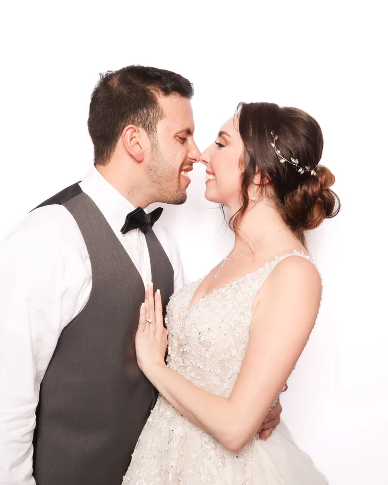Bride and groom sharing a moment in a Pro DSLR wedding photo booth in Orlando
