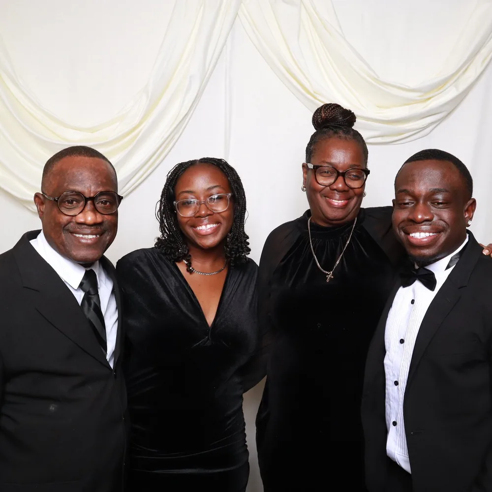 Wedding guests posing at a luxury photo booth during an Orlando wedding reception